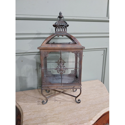 314 - Copperised metal and glass lantern. {61 cm H x 26 cm W x 17 cm D}.