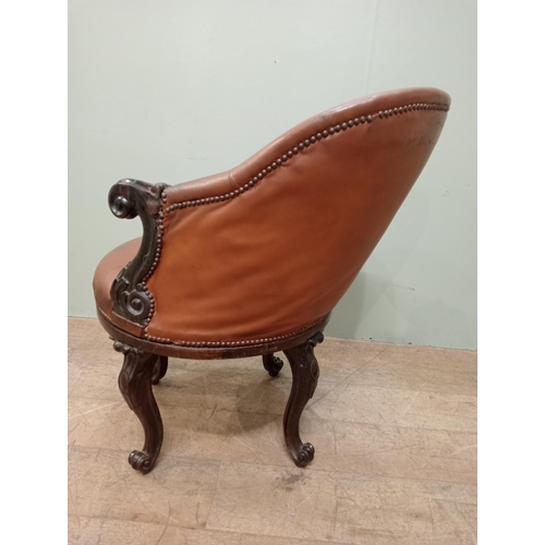 318 - Victorian walnut and upholstered tan leather swivel library chair tan leather cabriole legs and claw... 