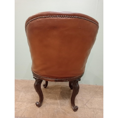 318 - Victorian walnut and upholstered tan leather swivel library chair tan leather cabriole legs and claw... 