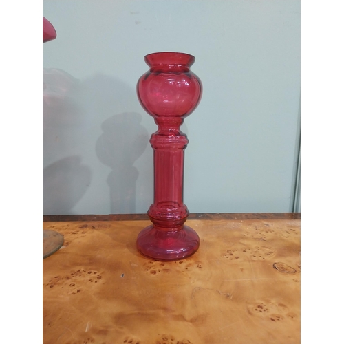 32 - Pair of Victorian ruby glass fluted vases {27 cm H} and two ruby glass candlesticks {22 cm H}.