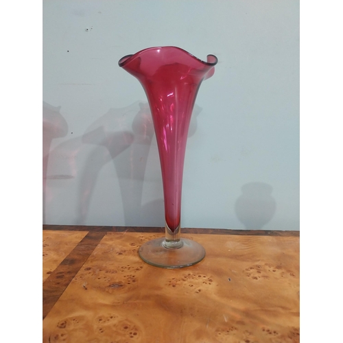 32 - Pair of Victorian ruby glass fluted vases {27 cm H} and two ruby glass candlesticks {22 cm H}.