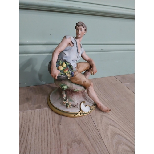 320 - Capodimonte figure of Gentleman. {21 cm H x 15 cm W x 17 cm D}.