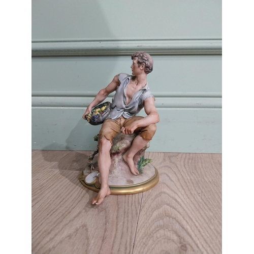 320 - Capodimonte figure of Gentleman. {21 cm H x 15 cm W x 17 cm D}.