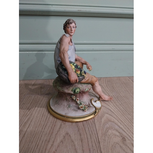 320 - Capodimonte figure of Gentleman. {21 cm H x 15 cm W x 17 cm D}.