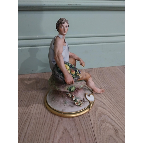 320 - Capodimonte figure of Gentleman. {21 cm H x 15 cm W x 17 cm D}.