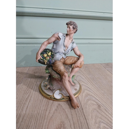 320 - Capodimonte figure of Gentleman. {21 cm H x 15 cm W x 17 cm D}.