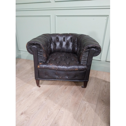 331 - Pair of 19th C hand dyed leather deep buttoned Chesterfield club chairs on tapered feet and castors.... 