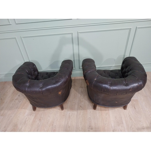 331 - Pair of 19th C hand dyed leather deep buttoned Chesterfield club chairs on tapered feet and castors.... 