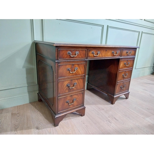 335 - Mahogany pedestal desk with inset leather top in the Victorian style. {77 cm H x 122 cm W x 61 cm}.