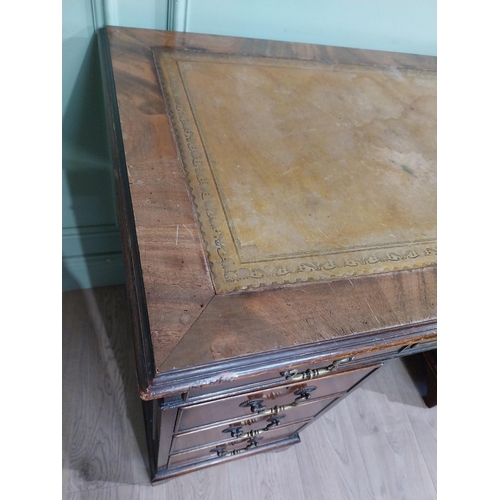 335 - Mahogany pedestal desk with inset leather top in the Victorian style. {77 cm H x 122 cm W x 61 cm}.