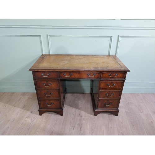 335 - Mahogany pedestal desk with inset leather top in the Victorian style. {77 cm H x 122 cm W x 61 cm}.