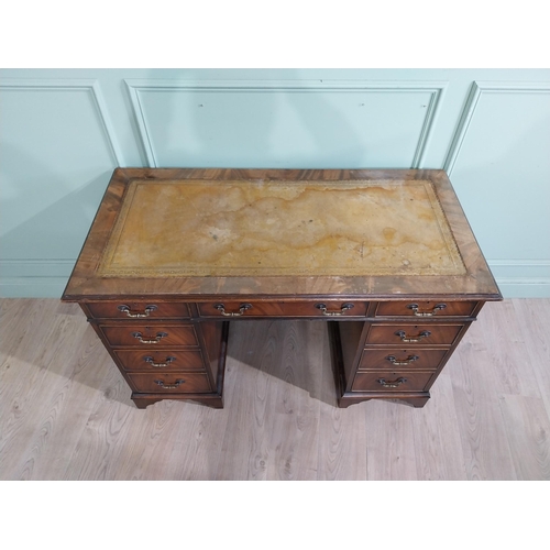 335 - Mahogany pedestal desk with inset leather top in the Victorian style. {77 cm H x 122 cm W x 61 cm}.