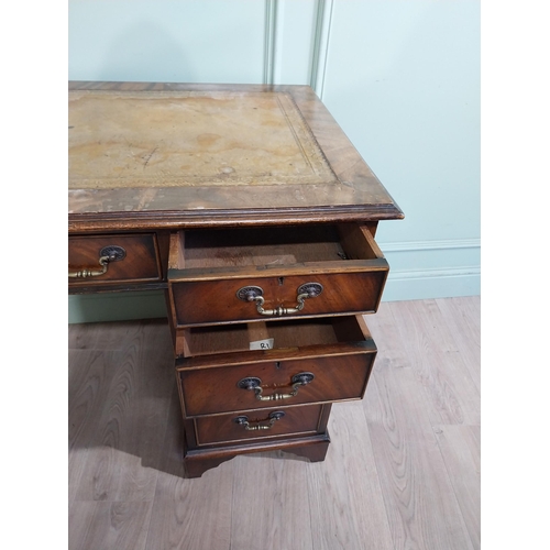 335 - Mahogany pedestal desk with inset leather top in the Victorian style. {77 cm H x 122 cm W x 61 cm}.