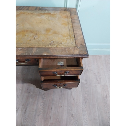 335 - Mahogany pedestal desk with inset leather top in the Victorian style. {77 cm H x 122 cm W x 61 cm}.