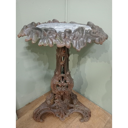 337 - Cast iron plant stand with marble insert. {H 66cm x Dia 48cm}.   NOT AVAILABLE TO VIEW IN PERSON