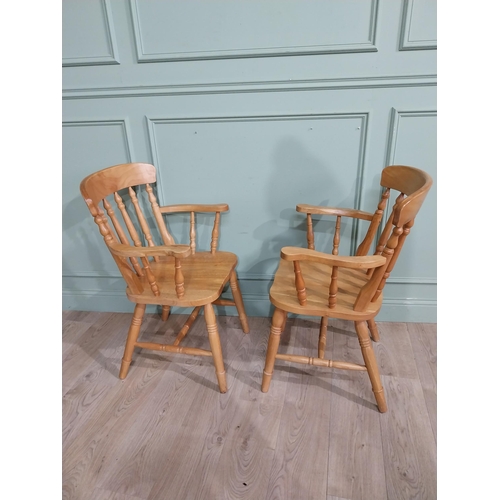 340 - Pair of pine kitchen armchairs on turned legs. {90 cm H x 56 cm W x 43 cm D}