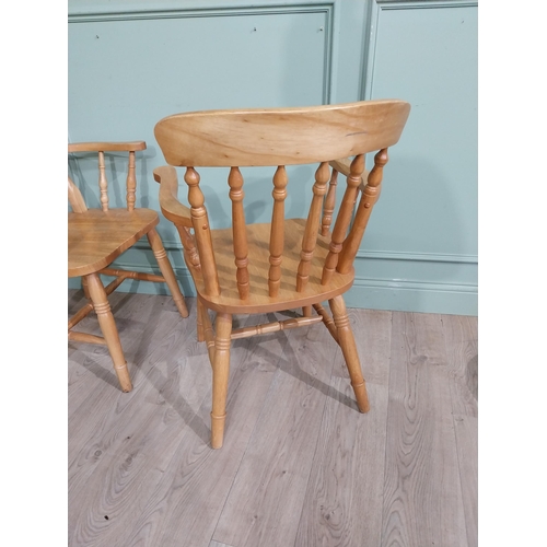 340 - Pair of pine kitchen armchairs on turned legs. {90 cm H x 56 cm W x 43 cm D}