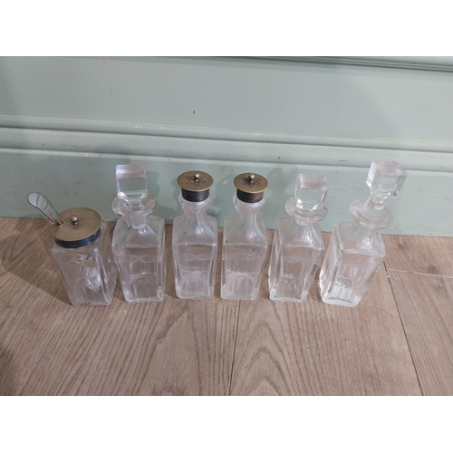 343 - Collection of Victorian cut glass bottles and two spoons {17 cm H to 5 cm H}.