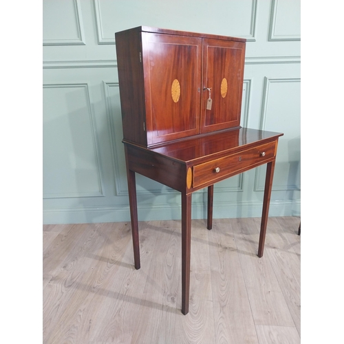 348 - Georgian mahogany and satinwood side cabinet with two long doors over one long drawer raised on tape... 