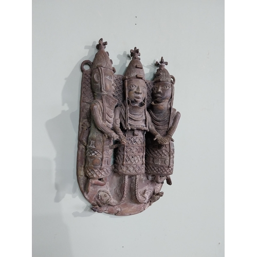 35 - African Benin bronze shrine depicting three warriors. {40 cm H x 24 cm W x 10 cm D].