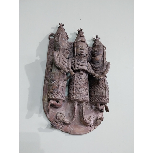 35 - African Benin bronze shrine depicting three warriors. {40 cm H x 24 cm W x 10 cm D].