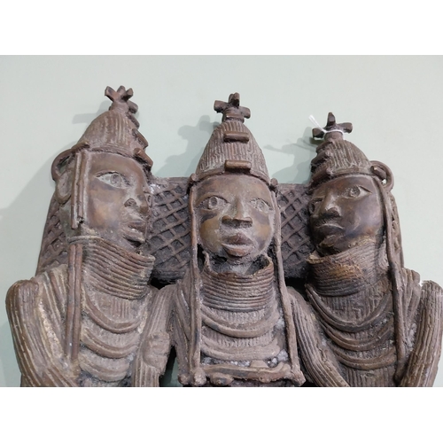 35 - African Benin bronze shrine depicting three warriors. {40 cm H x 24 cm W x 10 cm D].