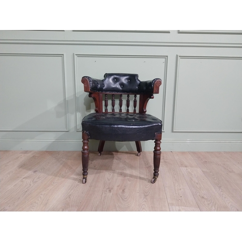 369 - Edwardian mahogany and leather upholstered office chair on reeded legs. {88 cm H x 68 cm W x 72 cm D... 