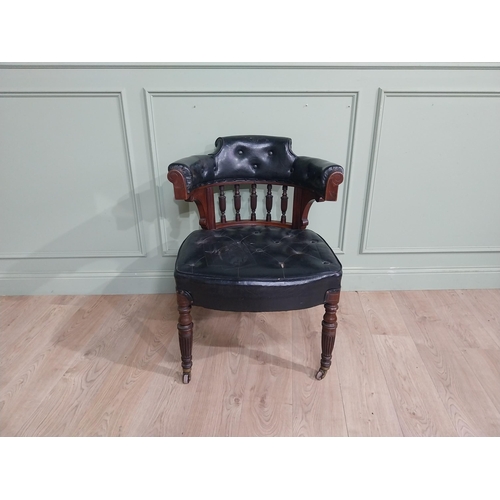 369 - Edwardian mahogany and leather upholstered office chair on reeded legs. {88 cm H x 68 cm W x 72 cm D... 