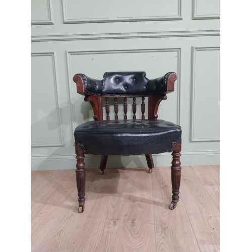 369 - Edwardian mahogany and leather upholstered office chair on reeded legs. {88 cm H x 68 cm W x 72 cm D... 