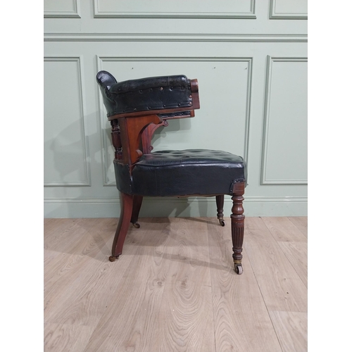 369 - Edwardian mahogany and leather upholstered office chair on reeded legs. {88 cm H x 68 cm W x 72 cm D... 