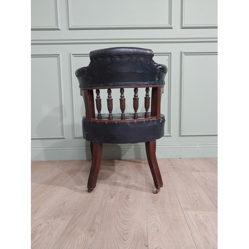 369 - Edwardian mahogany and leather upholstered office chair on reeded legs. {88 cm H x 68 cm W x 72 cm D... 