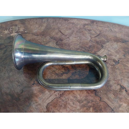 371 - Edwardian brass bugle. {16 cm H x 28 cm W x 10 cm D}.