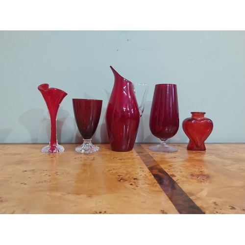 373 - Two ruby glass glasses, vase, bottle and jug. {23 cm H  to 10 cm H}.