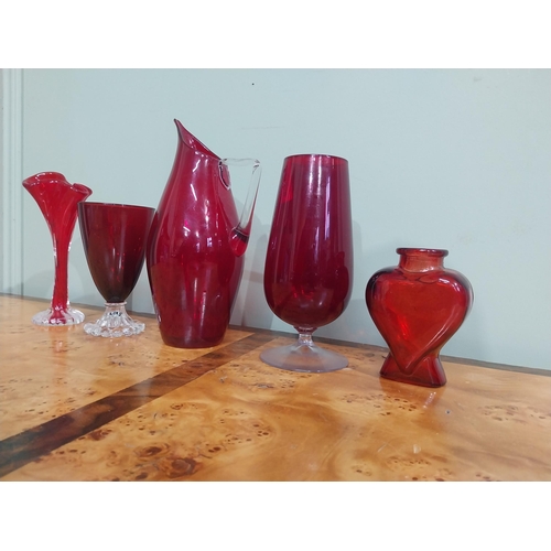 373 - Two ruby glass glasses, vase, bottle and jug. {23 cm H  to 10 cm H}.