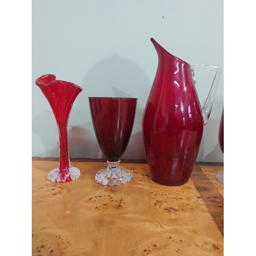 373 - Two ruby glass glasses, vase, bottle and jug. {23 cm H  to 10 cm H}.