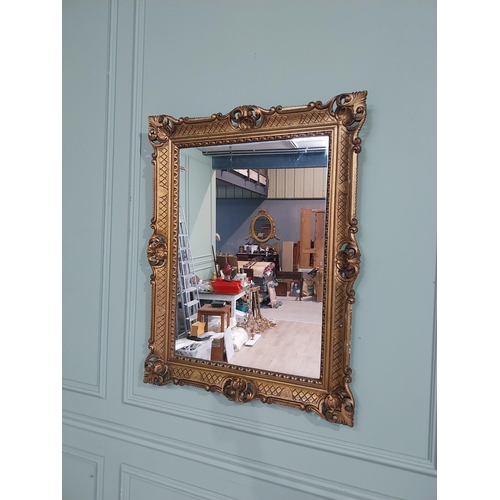 375 - Carved giltwood mirror in the  Victorian style. {88 cm H x 68 cm W}.