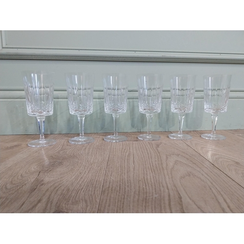 377 - Set of six cut glass crystal wine glasses. {17 cm H}.