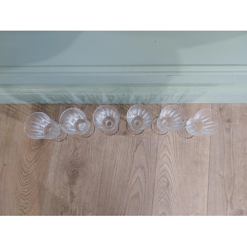 377 - Set of six cut glass crystal wine glasses. {17 cm H}.