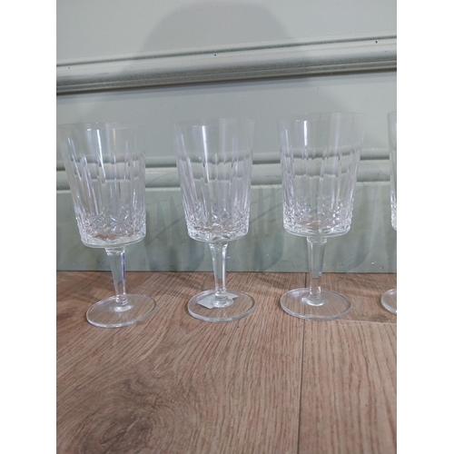 377 - Set of six cut glass crystal wine glasses. {17 cm H}.