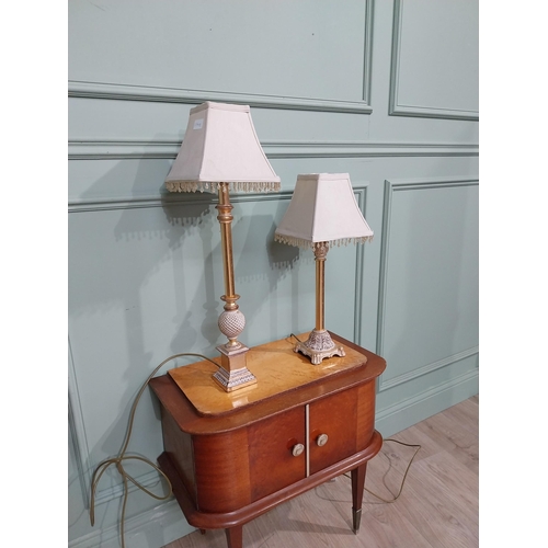 379 - Pair of decorative gilded resin table lamps with cloth shades. {69 cm H and 40 cm H}.