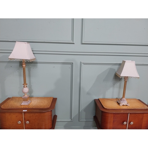 379 - Pair of decorative gilded resin table lamps with cloth shades. {69 cm H and 40 cm H}.