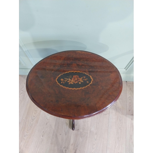 386 - 19th C. Burr walnut lamp table with floral central inlay raised on turned column with three outswept... 