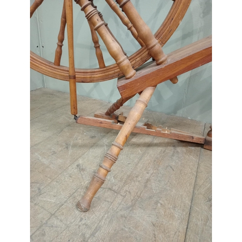 397 - Large oak spinning wheel.  {H 90cm x W 105cm x D 60cm}.  NOT AVAILABLE TO VIEW IN PERSON