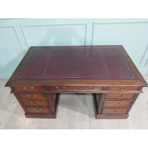 400A - Mahogany pedestal desk with inset leather top in the Victorian style. {77 cm H x 152 cm W x 90 cm}.