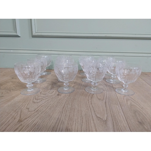 404 - Set of twelve cut glass Stuart crystal dessert bowls with etched grape and vine decoration. {12 cm H... 