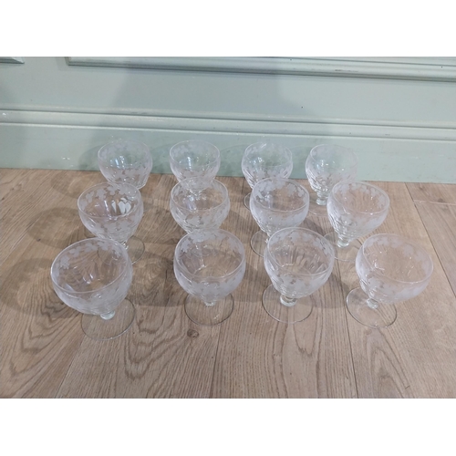 404 - Set of twelve cut glass Stuart crystal dessert bowls with etched grape and vine decoration. {12 cm H... 