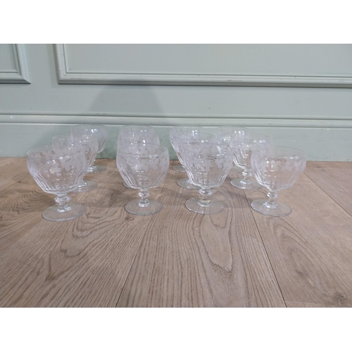 404 - Set of twelve cut glass Stuart crystal dessert bowls with etched grape and vine decoration. {12 cm H... 