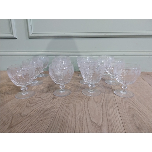 404 - Set of twelve cut glass Stuart crystal dessert bowls with etched grape and vine decoration. {12 cm H... 