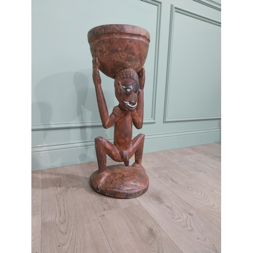 410 - Antique African hardwood figure. {70 cm H x 25 cm W x 28 cm D}.