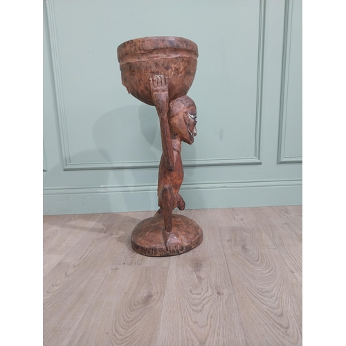 410 - Antique African hardwood figure. {70 cm H x 25 cm W x 28 cm D}.